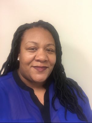 Dr. Charis Tucker